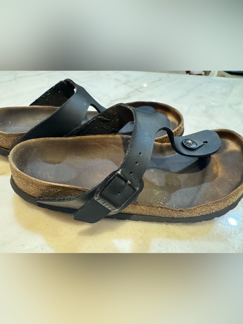 Women’s black Birkenstock Gizeh Thong Size 8 or 31 cork is cracked see pictures